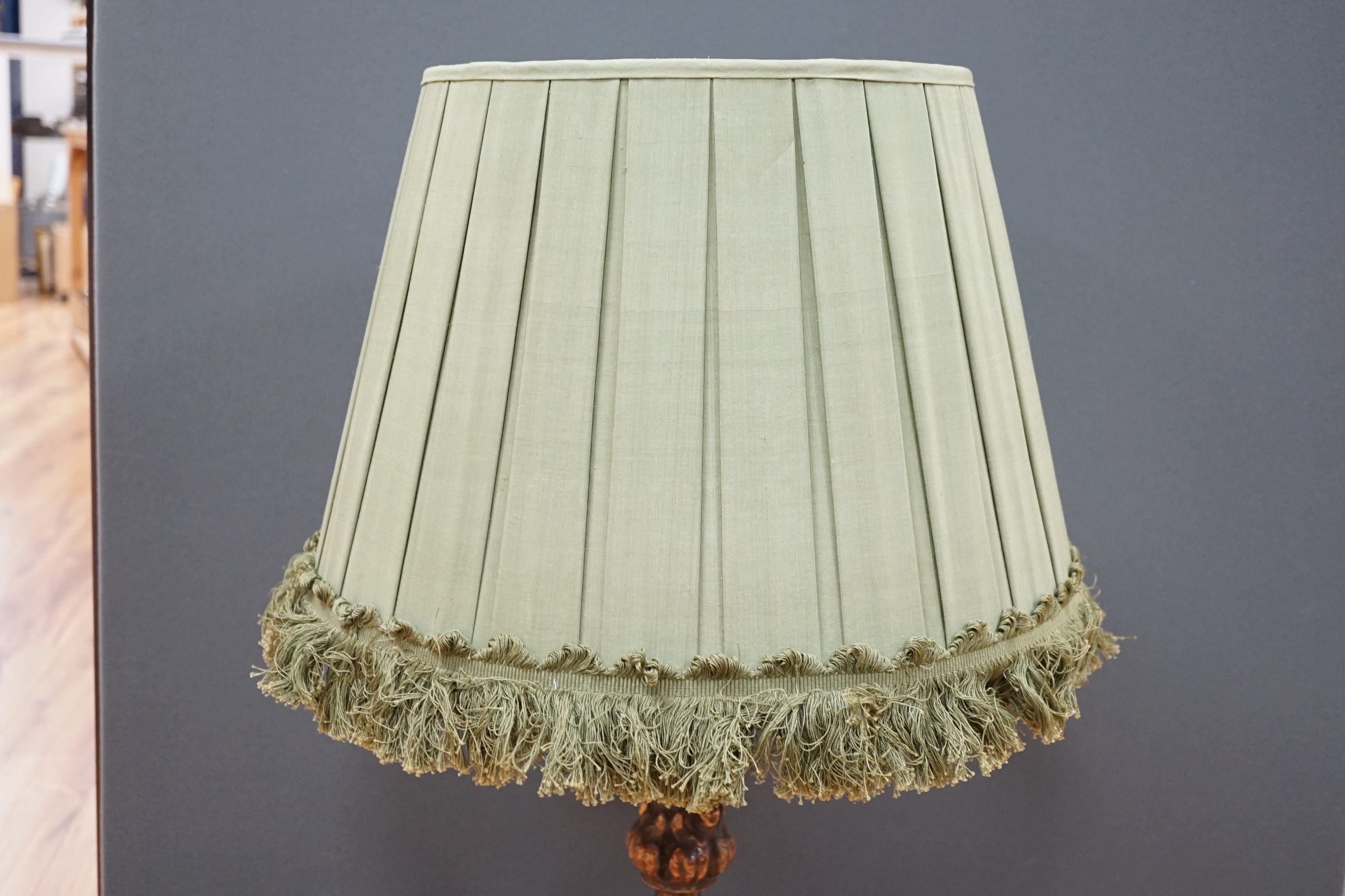 An Italian column lamp with green fabric shade, 88cm high including the shade